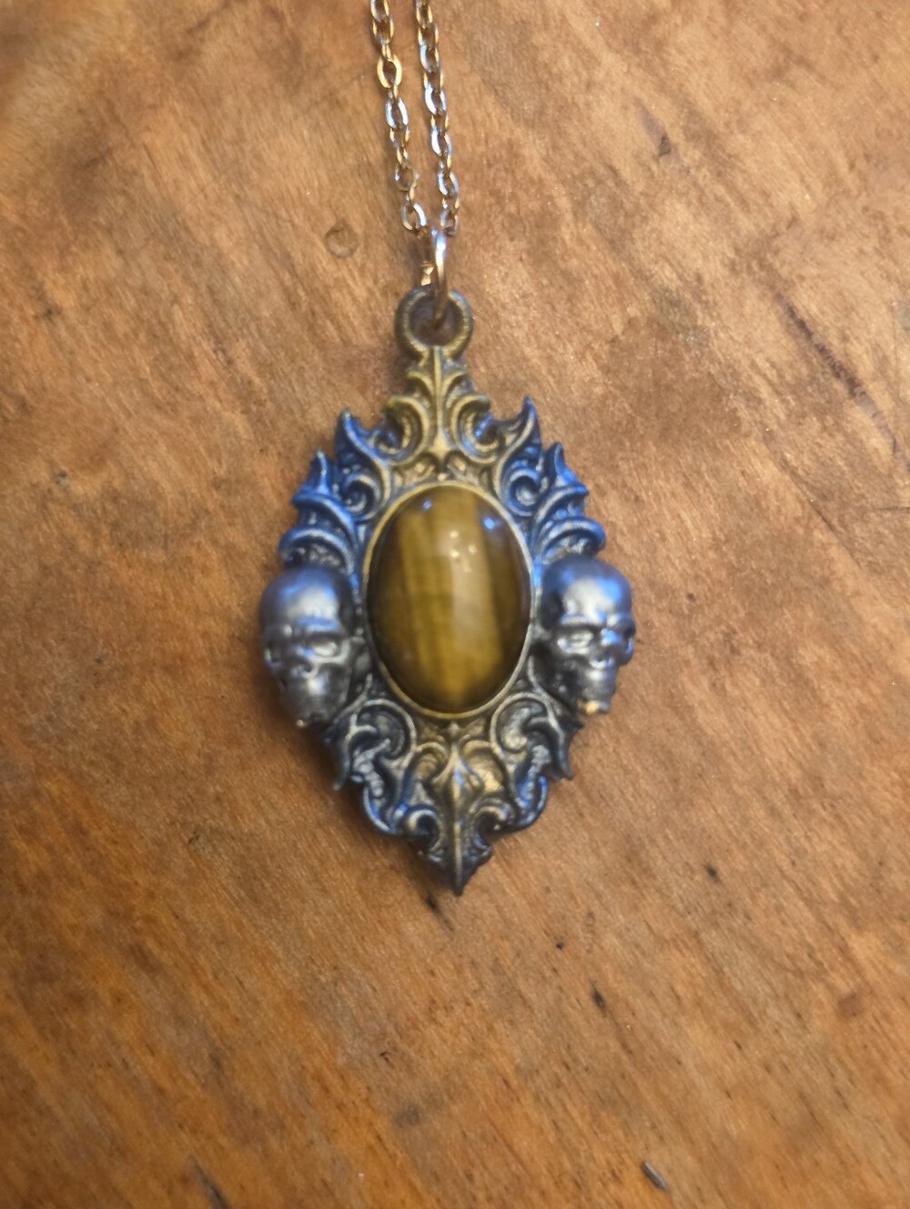 Silver & Gold Skull Frame With Tiger Eye Gemstone On Gold Tone Chain Necklace